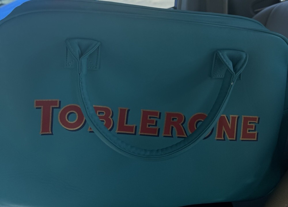 TOBLERONE Promotional RARE Limited Edition Green Soft Leather Zip Up Bowling Bag