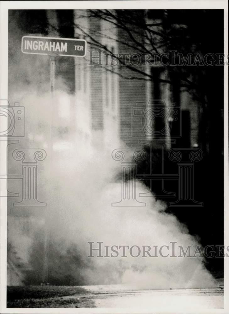 1990 Press Photo Smoke Rising from Manhole After Underground Fire in Springfield