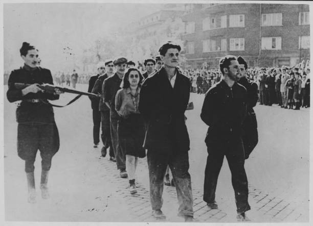 Traitors are marched through the capital of Bulgaria during a para- Old Photo