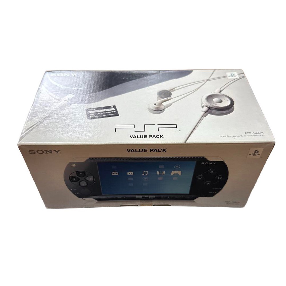 Sony PSP-1000K Value Pack with 4 UMD Games - PlayStation Portable Console Bundle