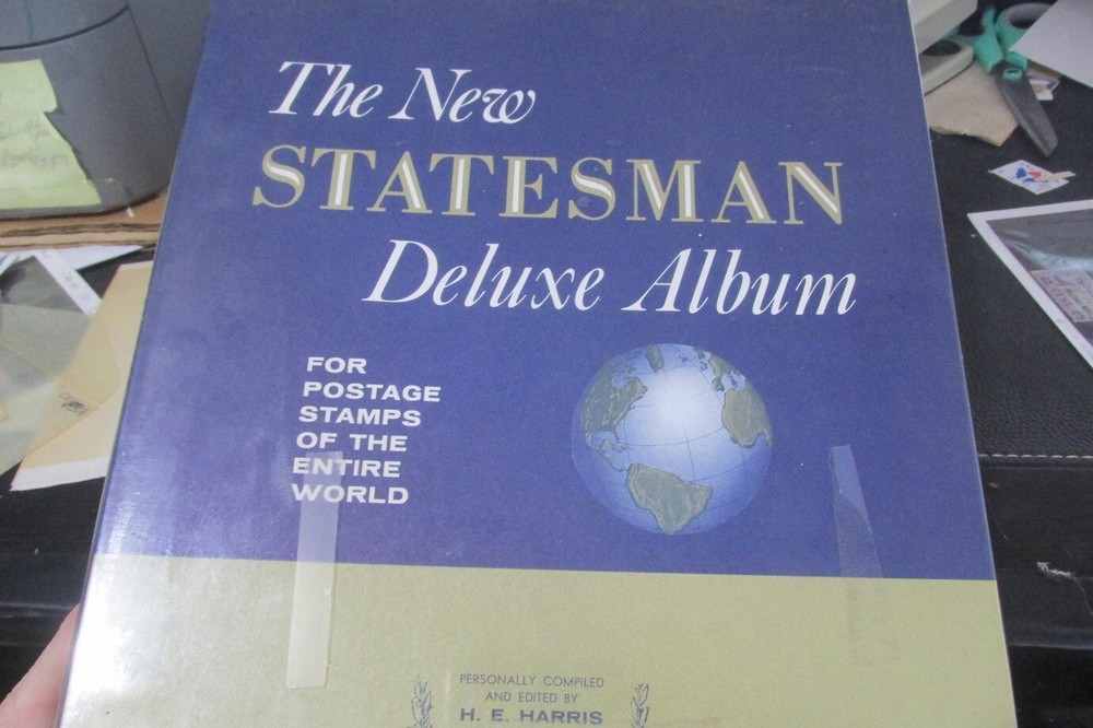 Harris Statesman album with many WW stamps