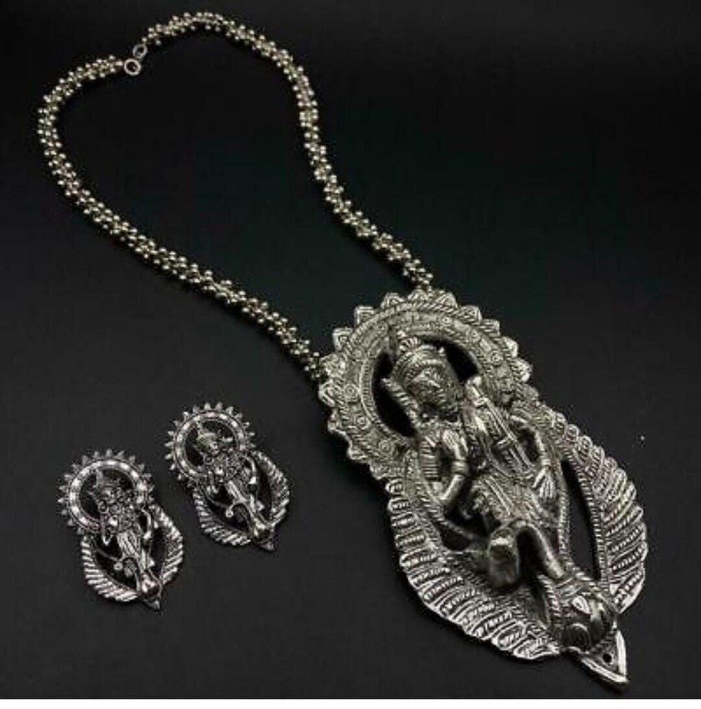 GERMAN SILVER SARASWATI MOTIF LONG NECKLACE WITH A PAIR OF STUD EARRING