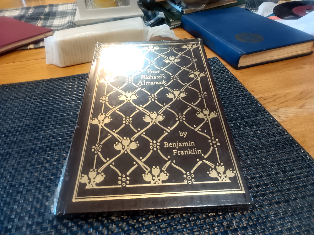 Poor Richards Almanack sealed in plastic mint - marked QP leather look