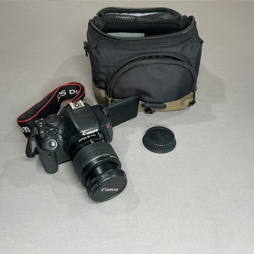 Canon EOS Rebel T3i DSLR Camera WITH 18x55 Lens, Camera Strap, Camera Bag & Bat