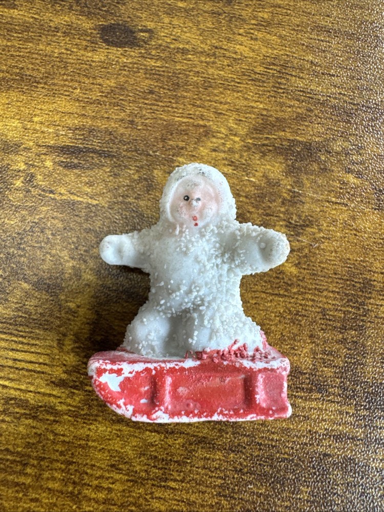 Antique Figure Small Sno Baby on Red sled German 1.5 inches