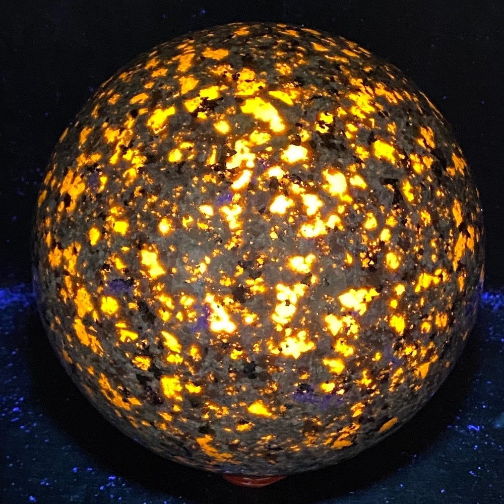 Natural Flame UV-reactive 4420G stone sphere for reiki healing