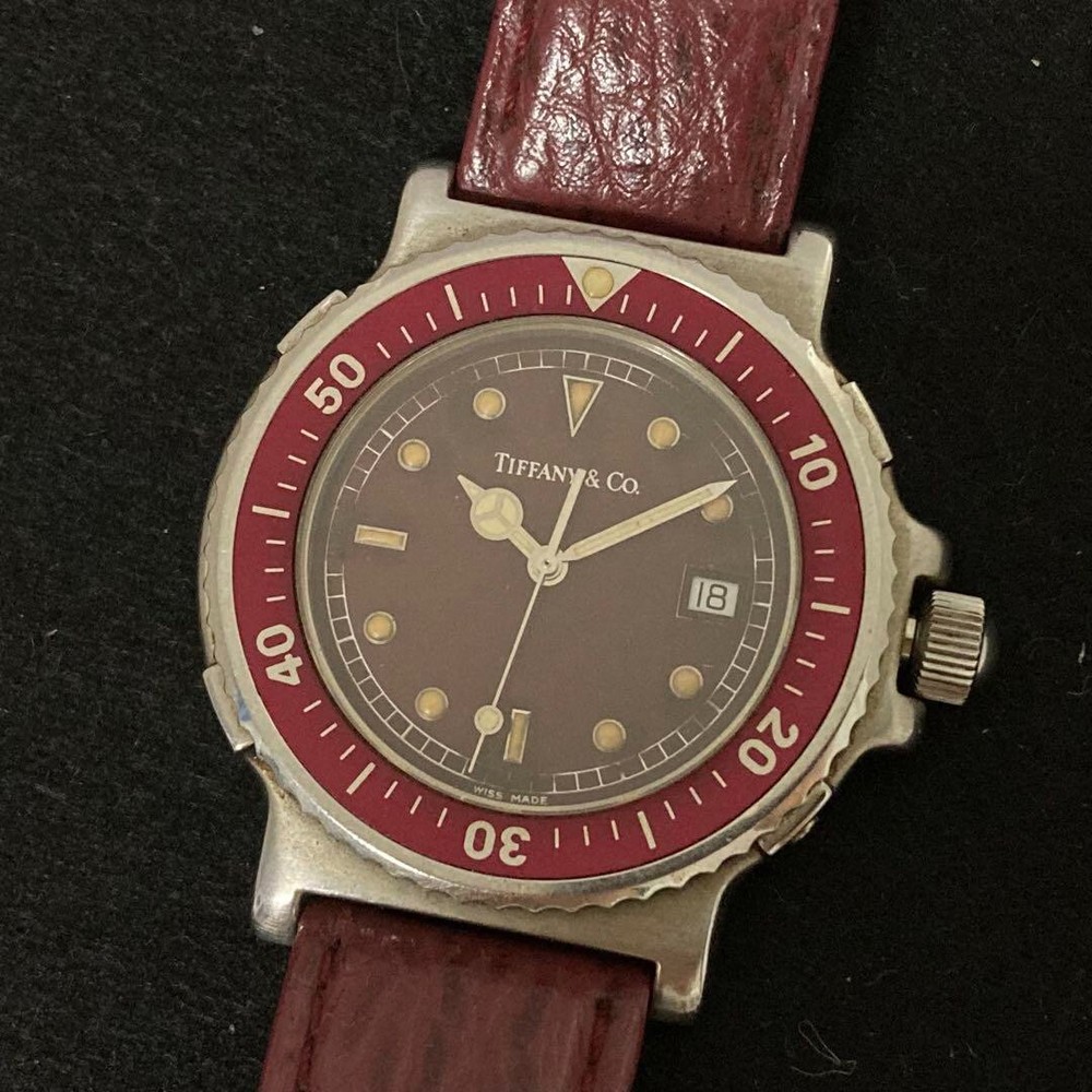 TIFFANY & Co. M0710 Quartz Diver Red Date Men's Watch From Japan