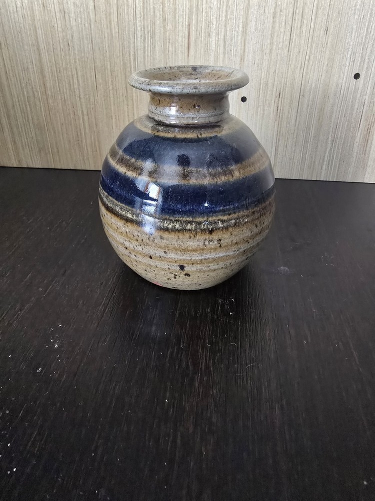 Handcrafted signed and dated pottery with vibrant glazing