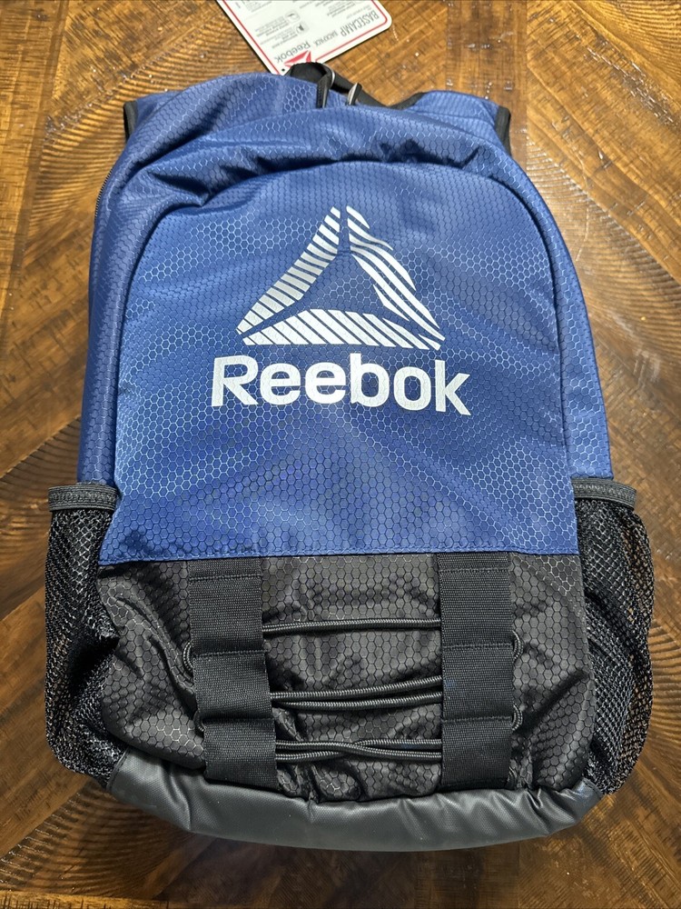 Reebok Basecamp Backpack in navy blue water res hydration storage reflective New