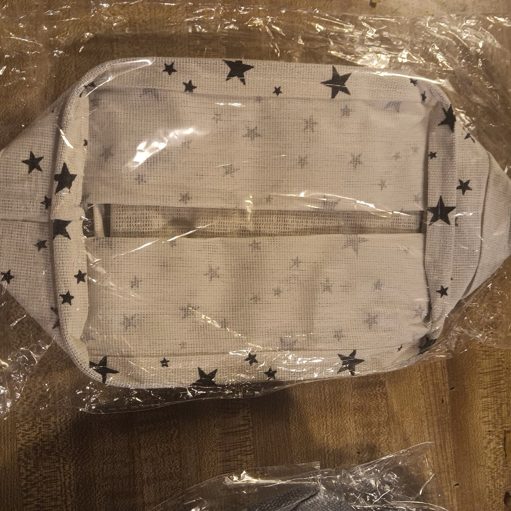 Square storage bin in white with black star design