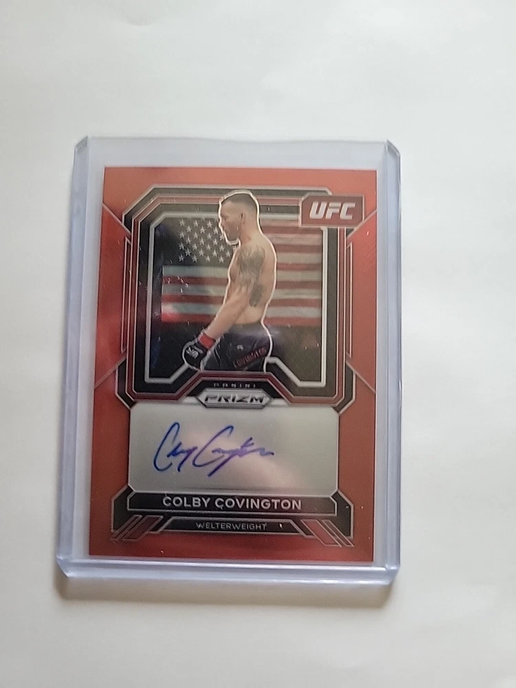 2023 Panini Prizm UFC - Superstar Autographs Red Prizm #SA-CCV Colby Covington /99 (AU)