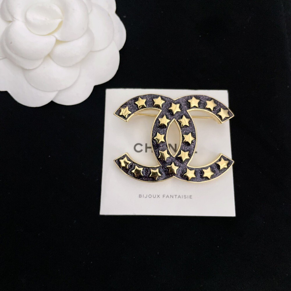 CHANEL 24C CCS Star Brooch in Black and Gold