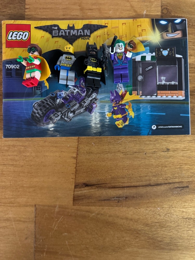 4 mini legos batman related and booklet