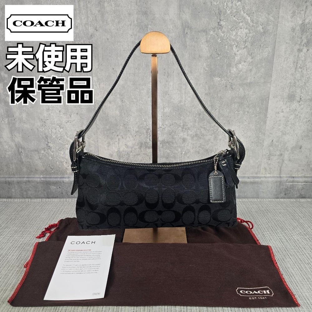 COACH Signature Black Handbag Accessory Bag with Iconic Logo