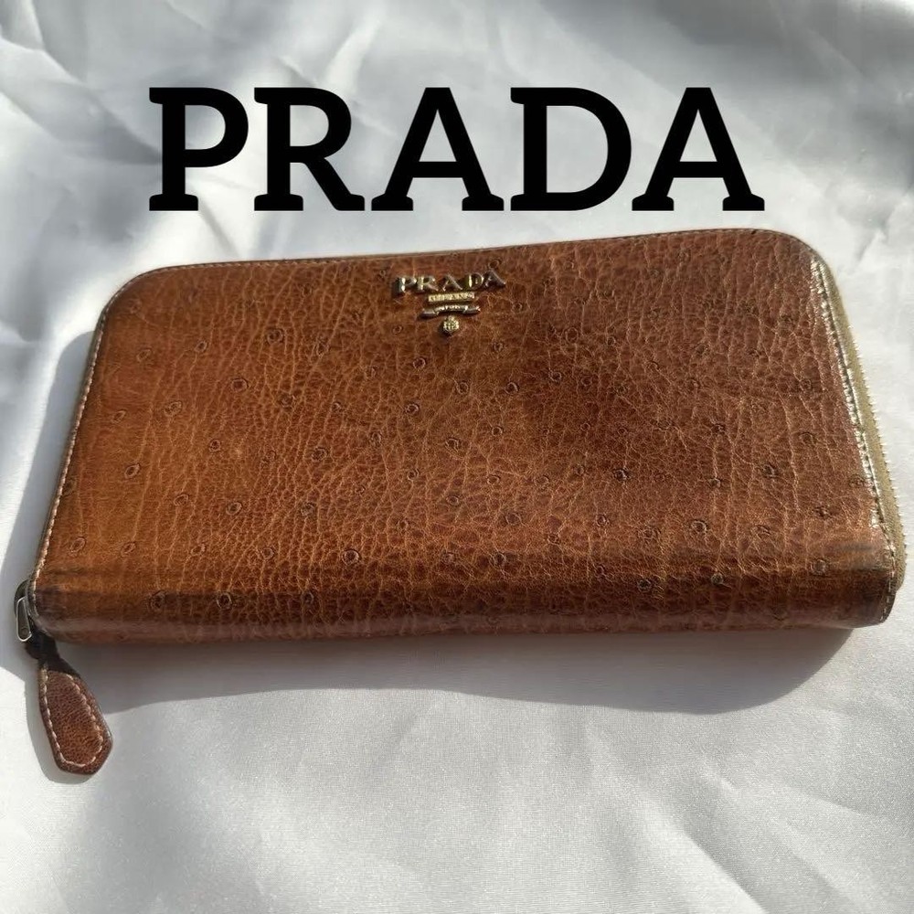 Prada Brown Leather Round Zipper Wallet with Gold Logo