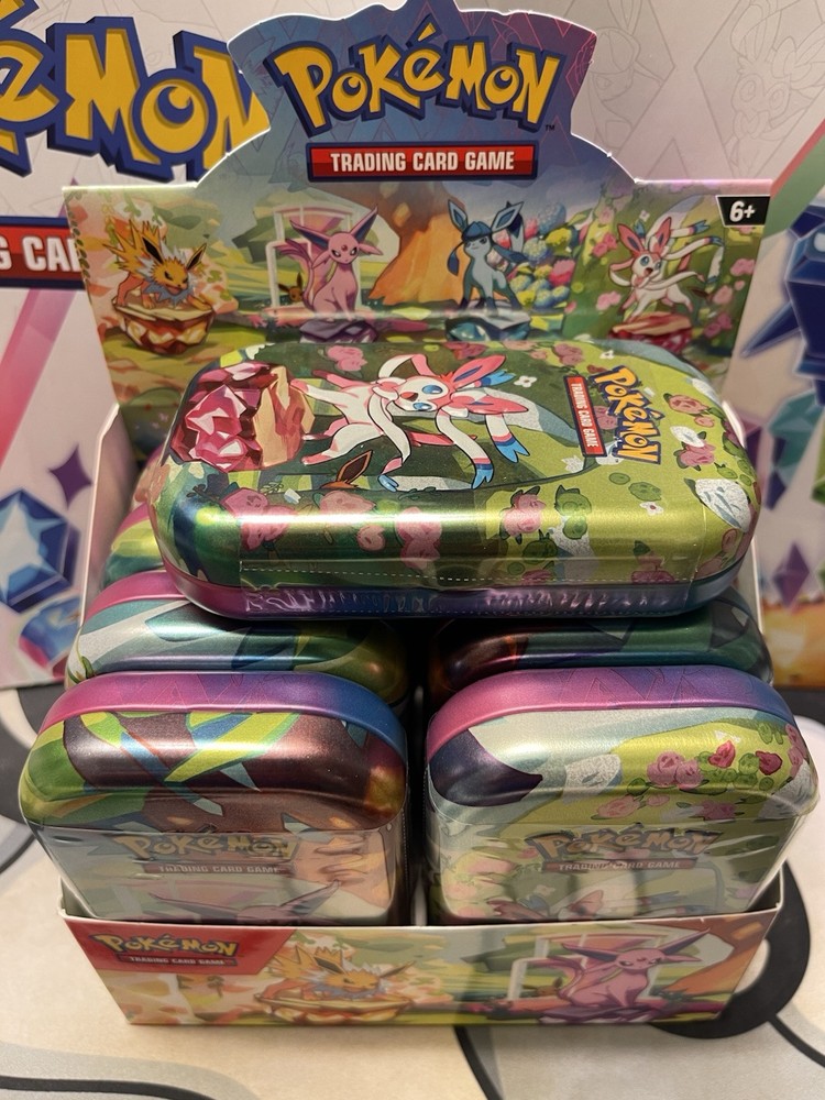 Pokemon Prismatic Evolutions Single Mini Tins