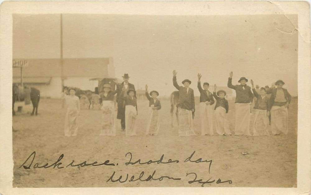 C-1910 Weldon Texas Sack Race people RPPC Postcard 25-7200