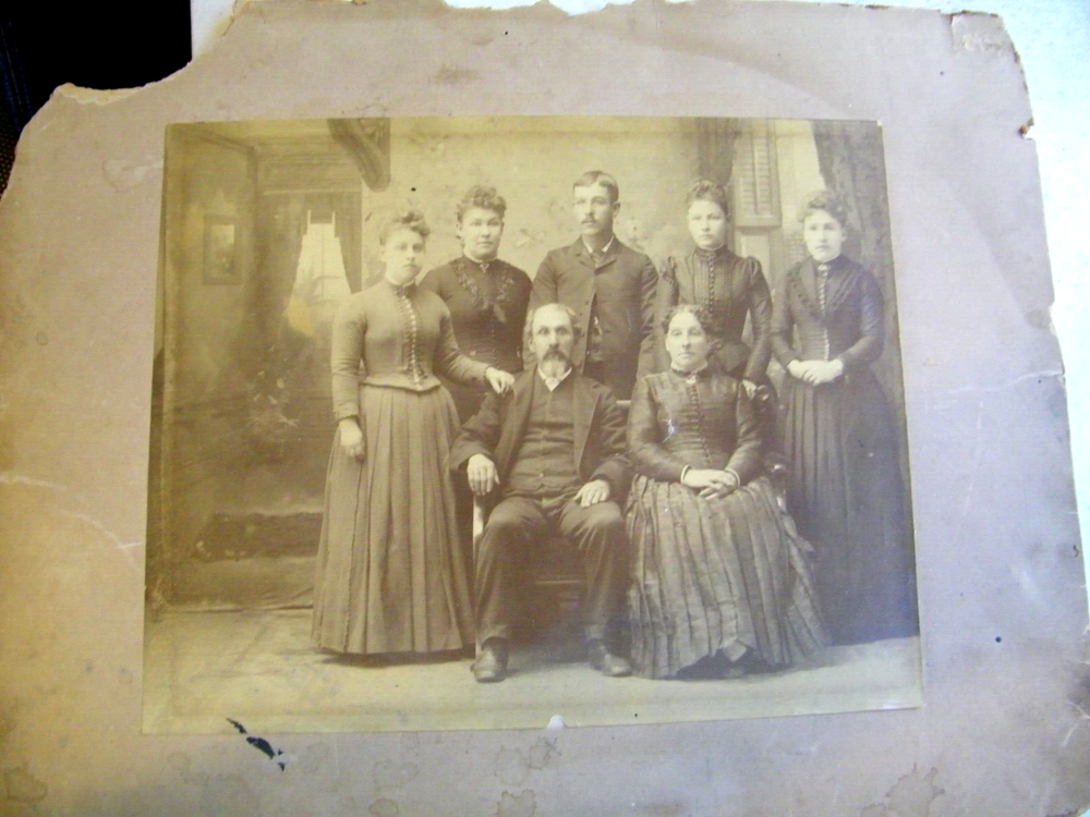 Vintage Real Photo Family in Old Indoor Setting  