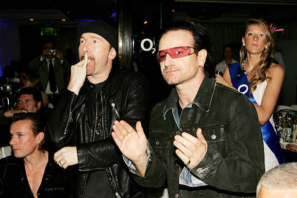 Members The Edge Bono attend the Nordoff Robbins Silver Clef Award- Old Photo-image