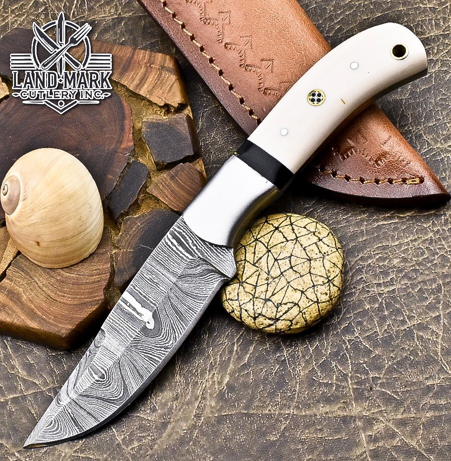 Custom Damascus Steel Hunting Skinner Knife with Sleek White Handle