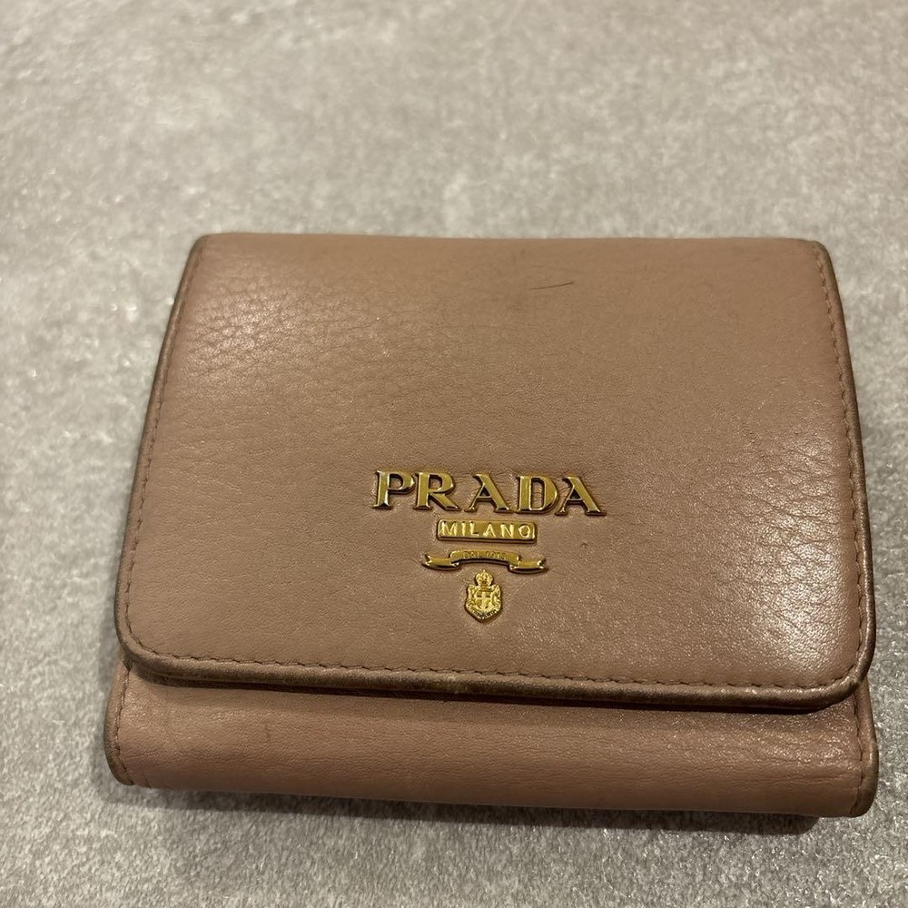 Prada Tri-Fold Wallet On Sale Now Campaign In Progress