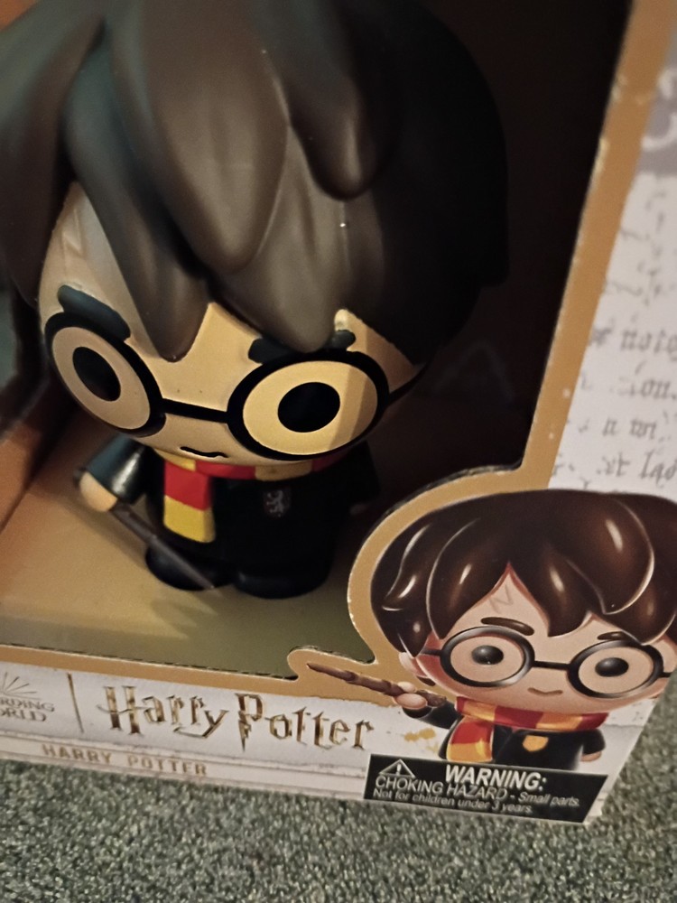 Harry Potter Collectible Vinyl Figure with Wand and Scarf