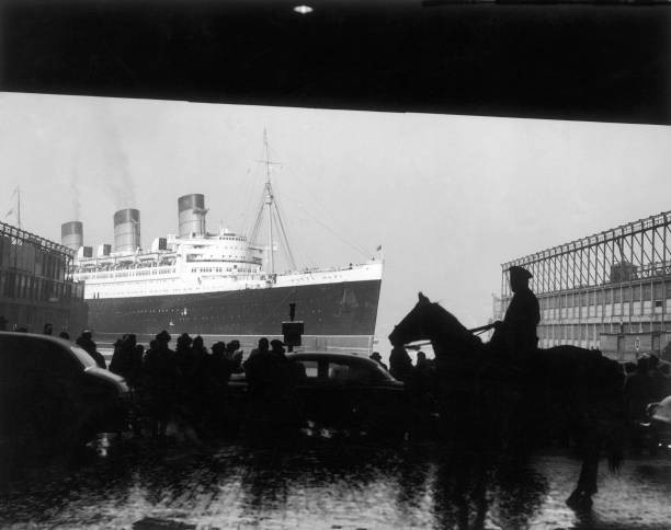 The liner QUEEN MARY attempting to dock without help of 20 tugboat- Old Photo