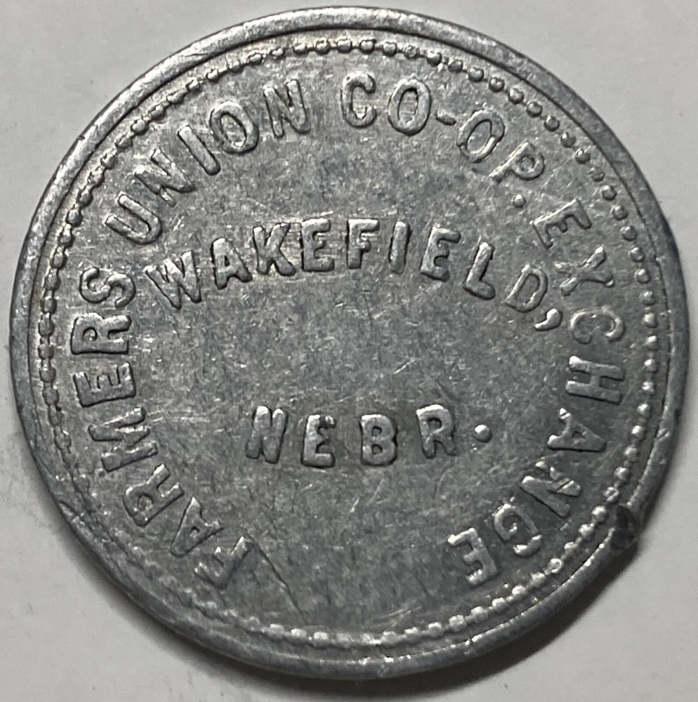 TRADE TOKEN ~ FARMERS UNION CO-OP ~ WAKEFIELD, NE  ~ GOOD FOR 10¢ IN MERCHANDISE