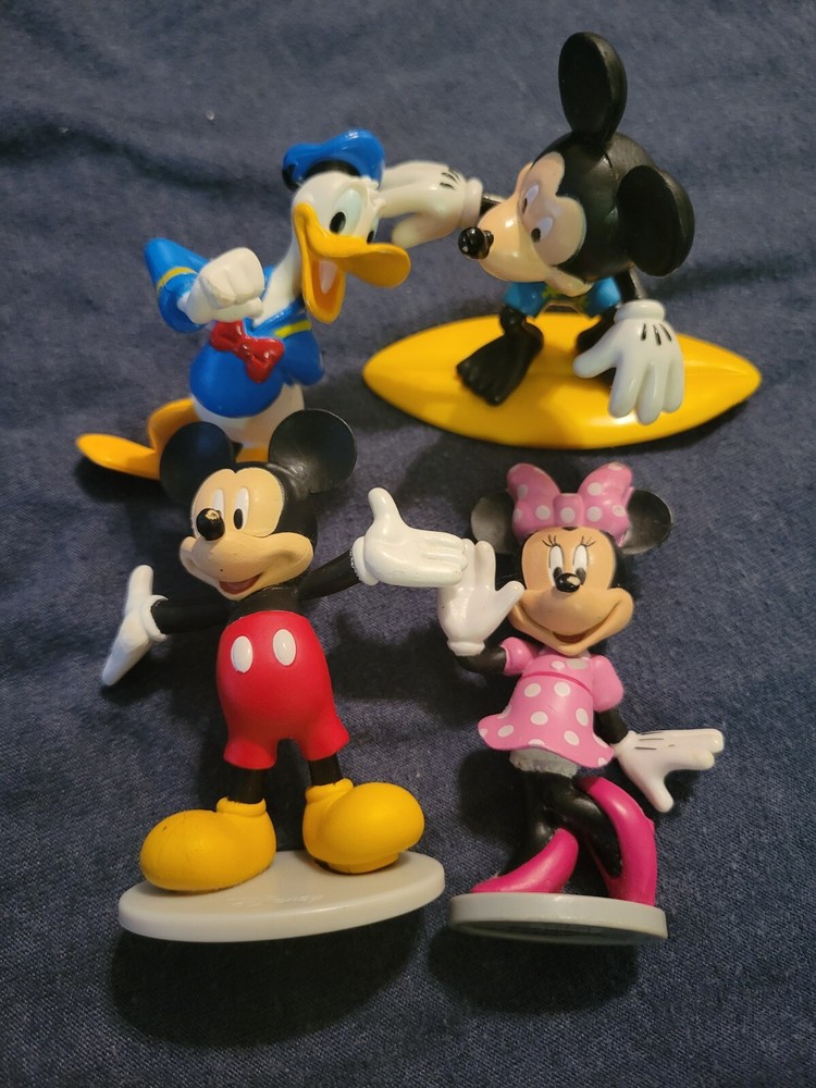 LOT OF 4 WALT DISNEY  FIGURINES