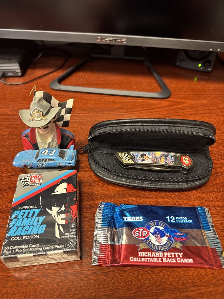 Richard Petty Memorabilia Lot - 12 Collector Cards, 50 Cards, Statue, And Knife
