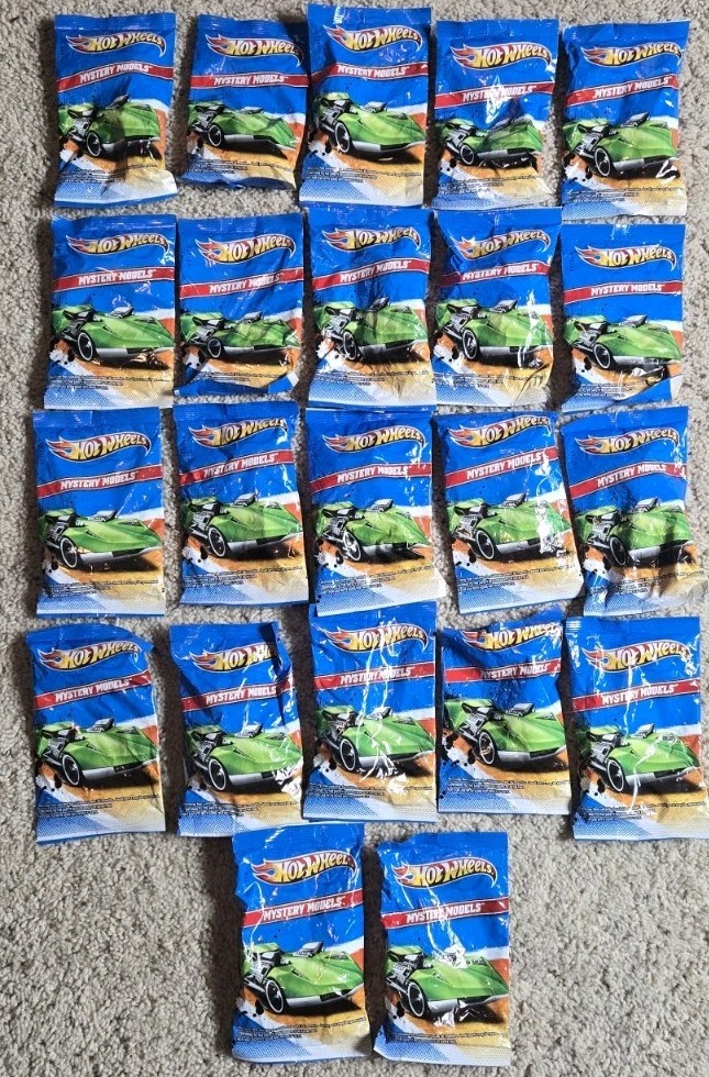 (23) Hot Wheels Mystery Models of 2011. New in Original Bags.