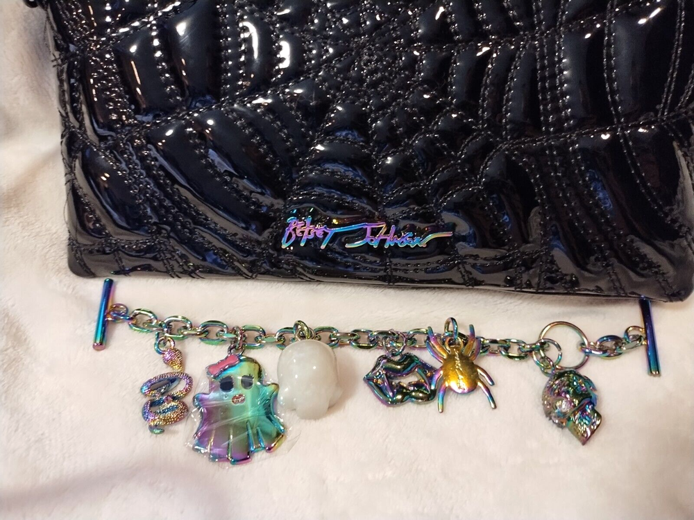 Betsey Johnson spiderweb crossbody bag with detachable charm bracelet  