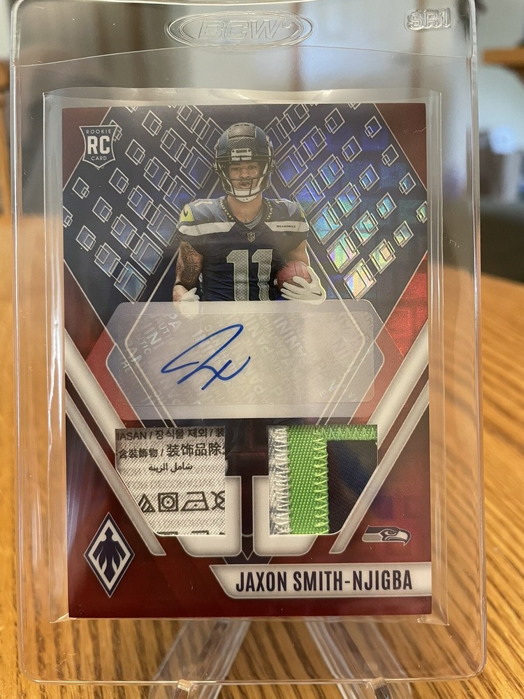 2023 Panini Phoenix Jaxon Smith-Njigba FOTL Dual Laundry Tag RPA Red /25 JSY#