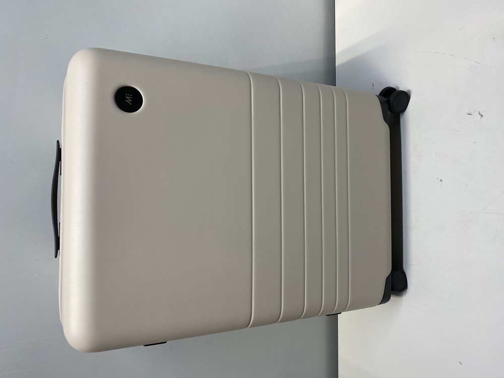 Monos Medium Check-In Luggage in Desert Taupe Color