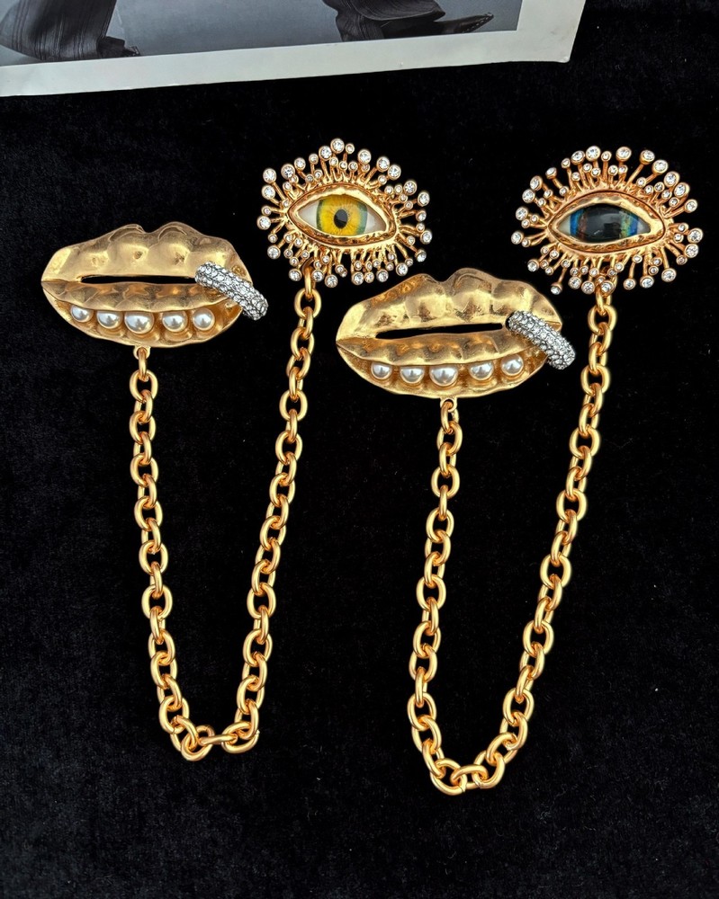 Schiaparelli Full diamond eyes with pea clip chain brooch with box and dust bag