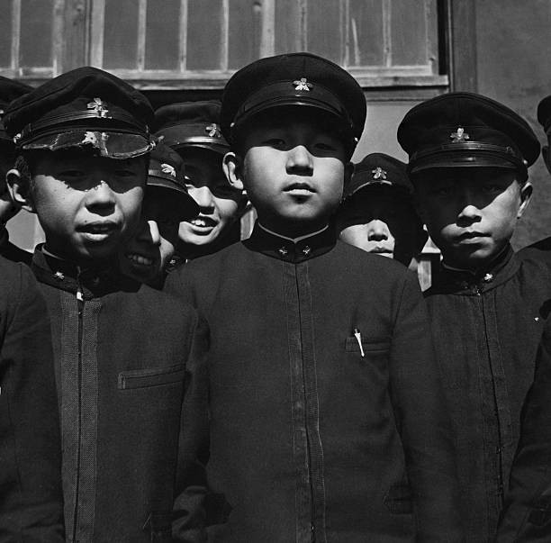 The Crown Prince Akihito with some of his fellow students at the I- Old Photo
