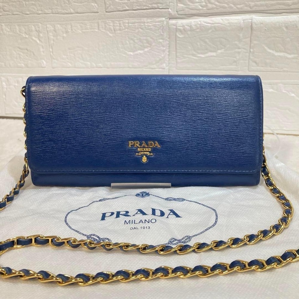 Prada Saffiano leather blue crossbody bag with gold chain for women