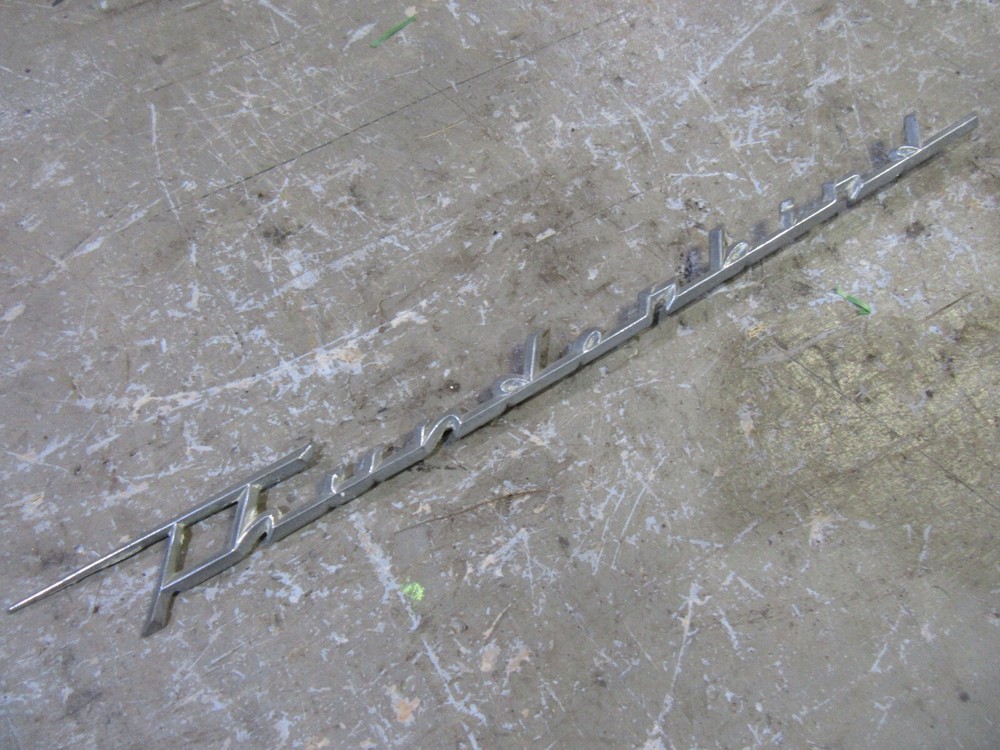1958 Ford Thunderbird exterior fender THUNDERBIRD chrome emblem trim molding