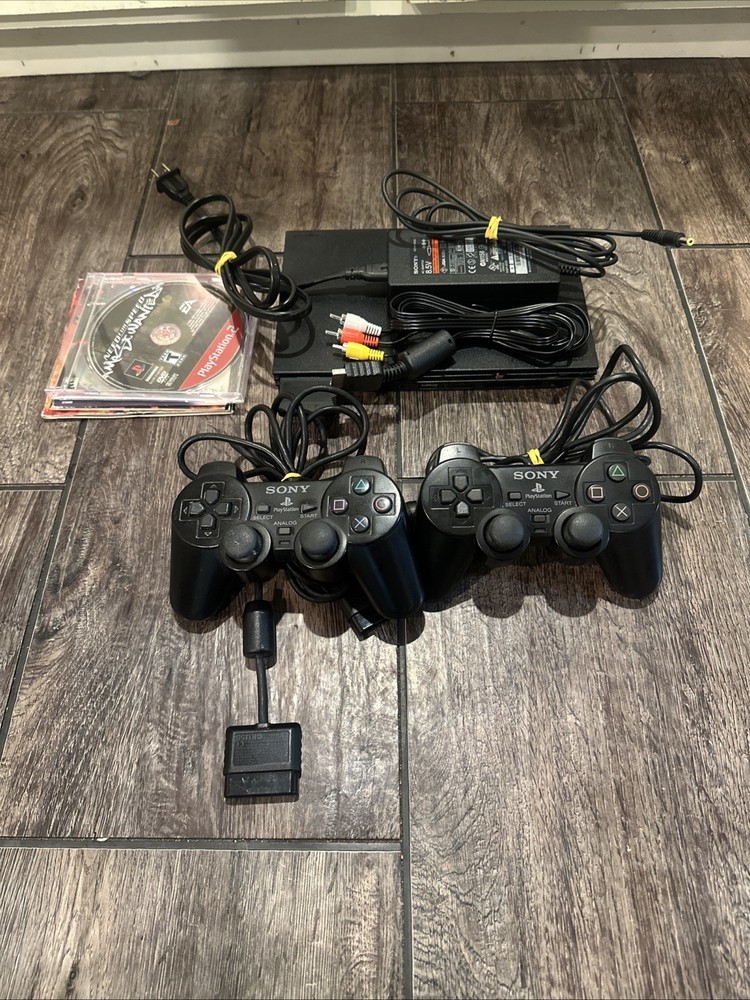 Sony PS2 Slim Bundle with Games and Accessories