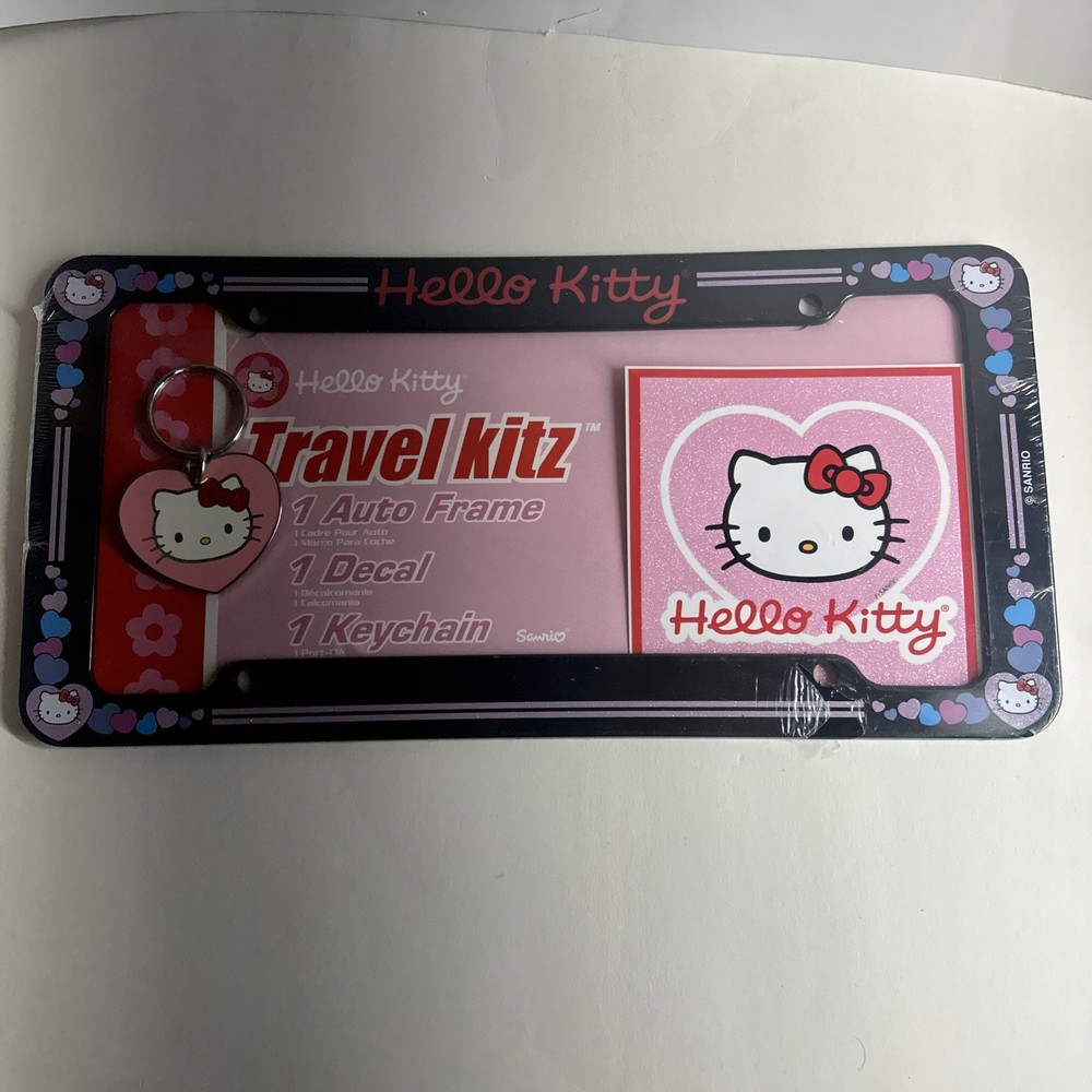 2000s 2007 Sanrio Hello Kitty black sparkle heart license plate frame