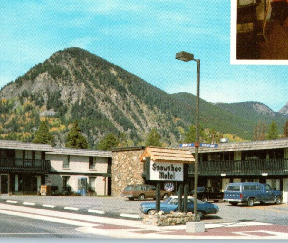 Snowshoe Motel Mountains Sky off HWY 70 AAA Old Ford Truck Vintage Postcard A5