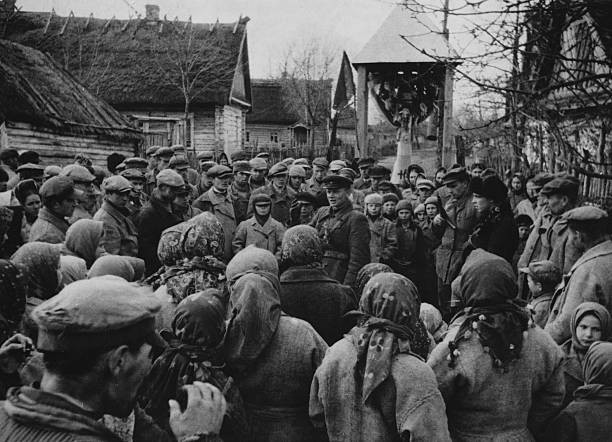 Russian guerilla deep behind German enemy lines addresses a group - Old Photo