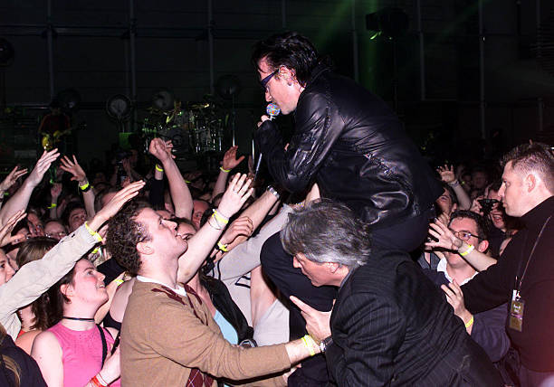 Bono in the crowd at the finale of the Brit Awards at Earls Court- Old Photo 2