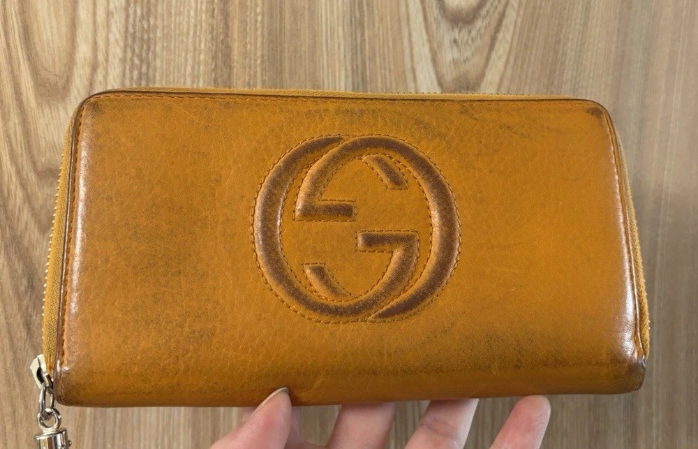 GUCCI Orange Leather Long Wallet with Logo, Zipper & Tassel Design