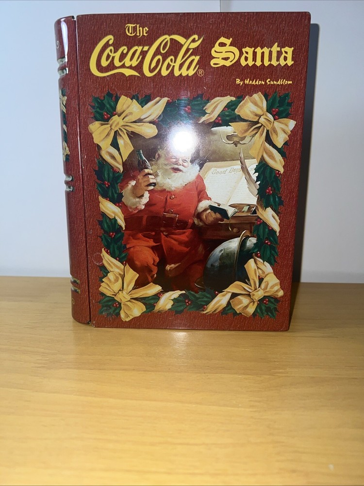 retro Haddon Sundbloom Santa Claus Tin picture Coca Cola Tin book shaped 6x8x1.5