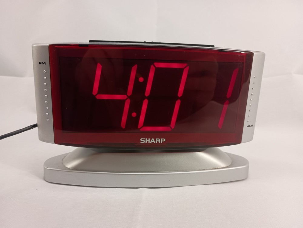 Digital Alarm Clock Sharp Model SPC033 Red  Clock with Swivel Case Silver