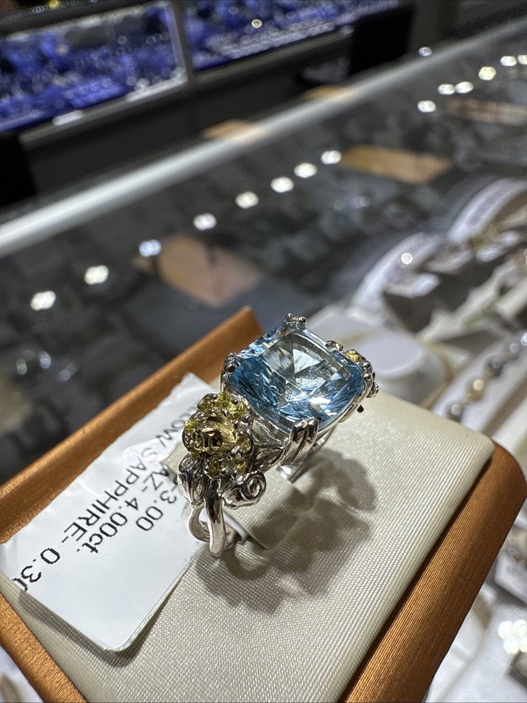 Silver and 18kt Gold Blue Topaz Ring with Yellow Sapphires Signed by STAMBOLIAN