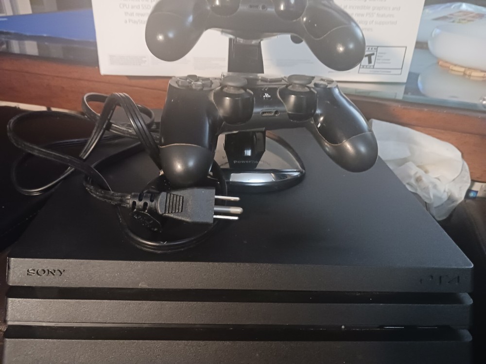 Sony PS4 with 2 controllers - Pre-owned in excellent condition