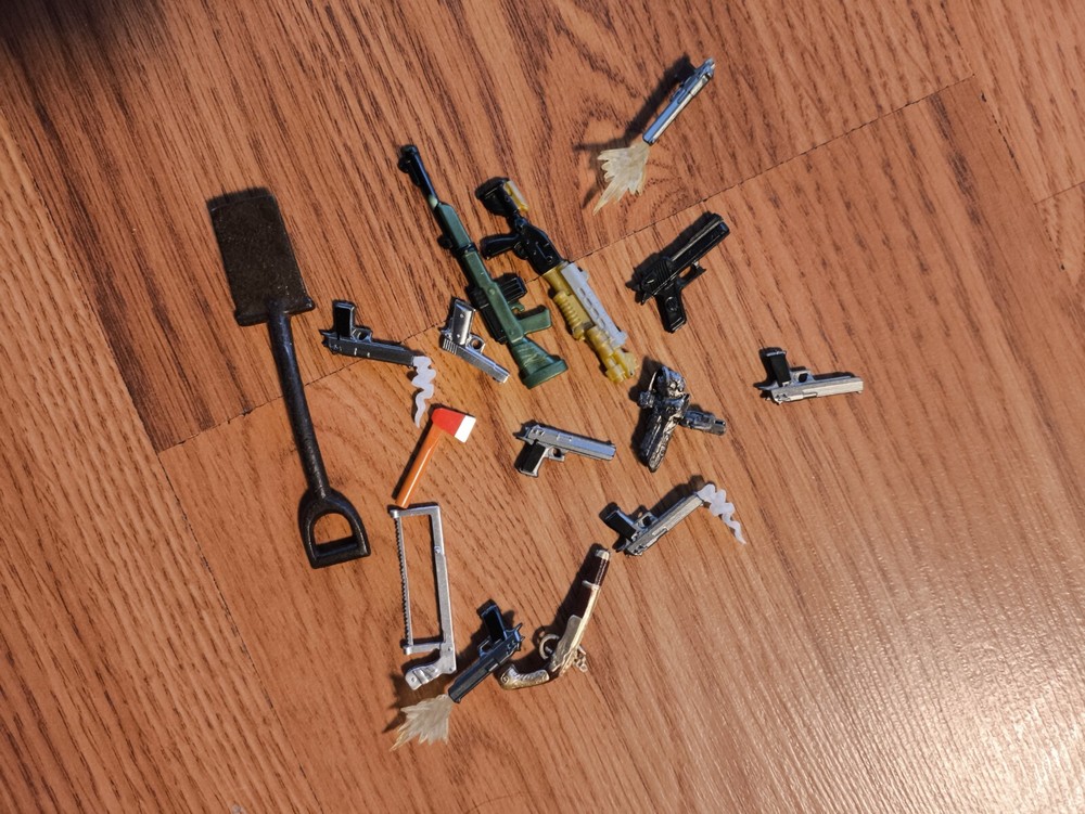 Lot Of Different Small Tiny Weapon Toys