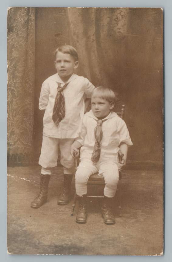 Brothers Charlie and Bryce in white shirts and silk tie vintage RPPC studio portrait